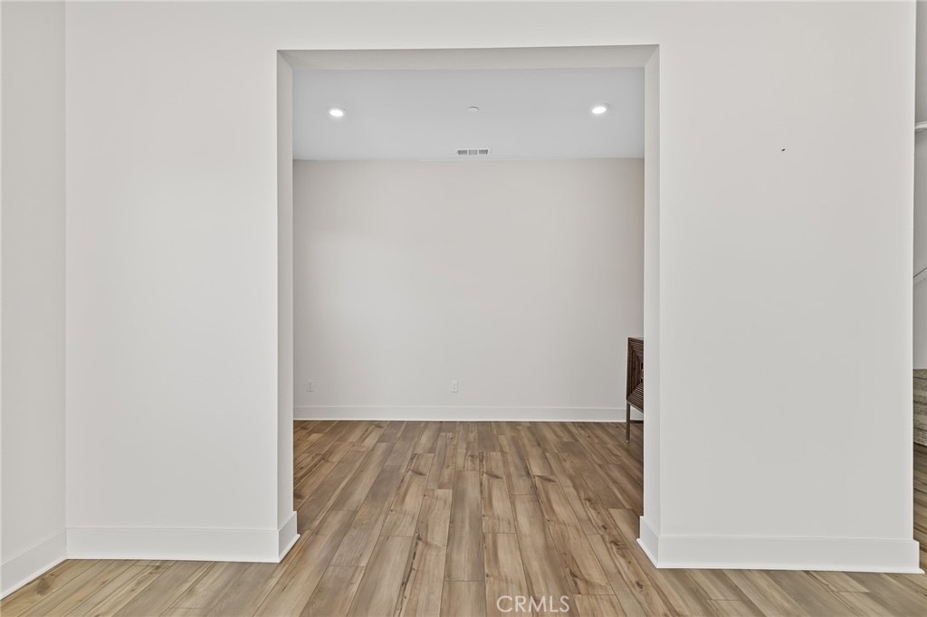 8691 Innovation Street Chino, CA 91708 - Photo 34 of 67 A den next to the living room