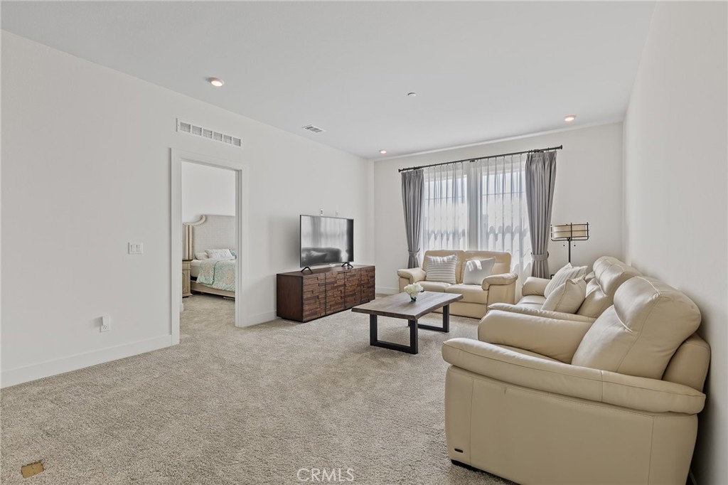 8691 Innovation Street Chino, CA 91708 - Photo 41 of 67 Upstairs family room