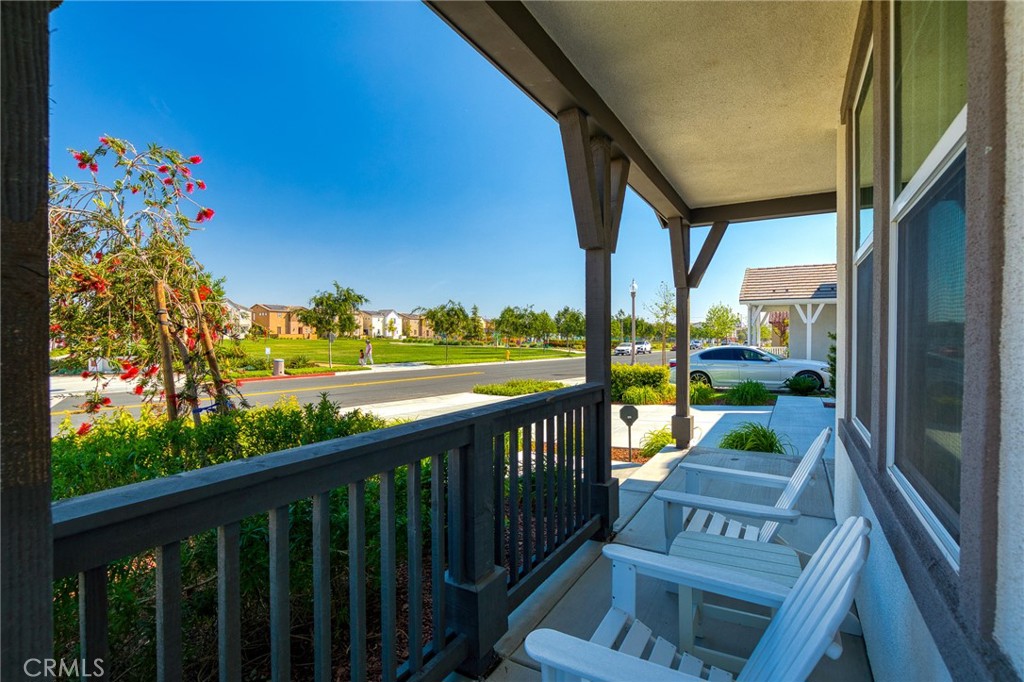 8691 Innovation Street Chino, CA 91708 - Photo 10 of 67 Porch face a tranquil park.