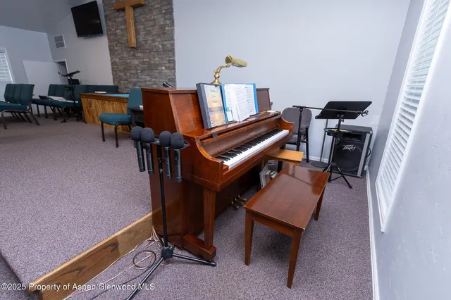 a room with a chair and a table