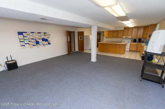 a view of a livingroom with a staircase
