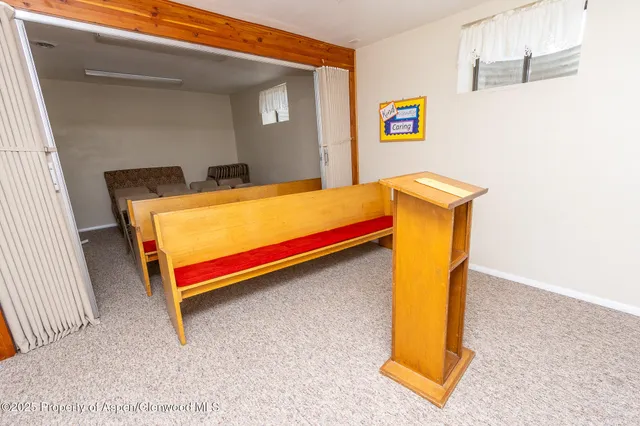 a room with furniture and a window