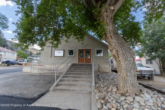 a view of livingroom with furniture and window