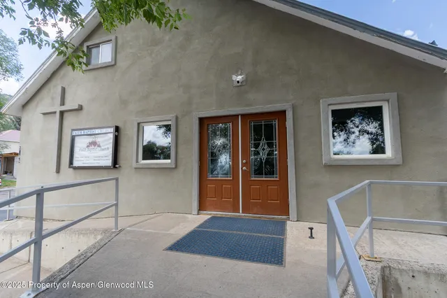a front view of a house with a garage