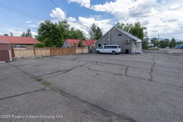 a view of outdoor space with car parked