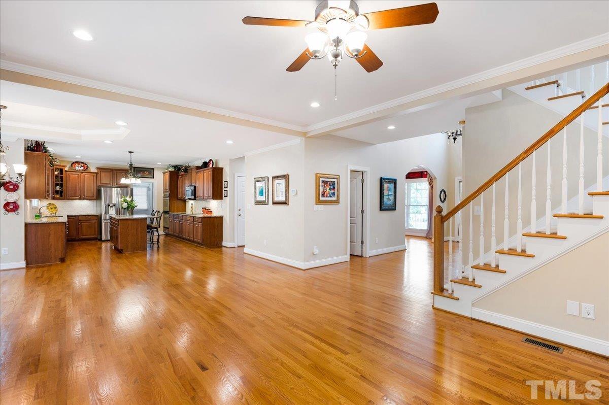 2624 Falls River Avenue Raleigh, NC 27614 - Photo 19 of 38 a view of a livingroom with a flat screen tv