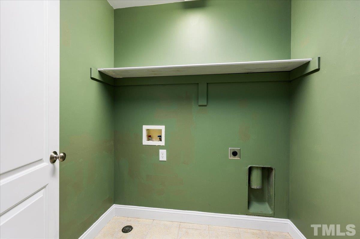 2624 Falls River Avenue Raleigh, NC 27614 - Photo 27 of 38 a bathroom with a sink