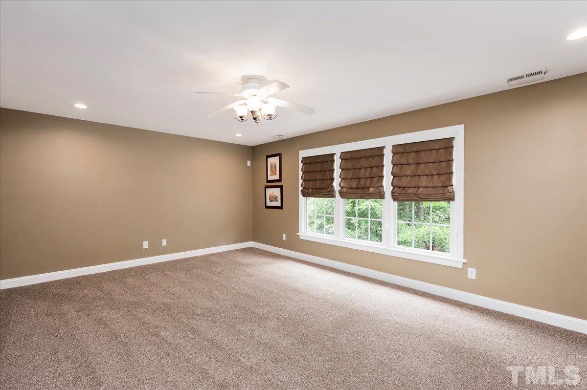2624 Falls River Avenue Raleigh, NC 27614 - Photo 28 of 38 a view of an empty room with a window