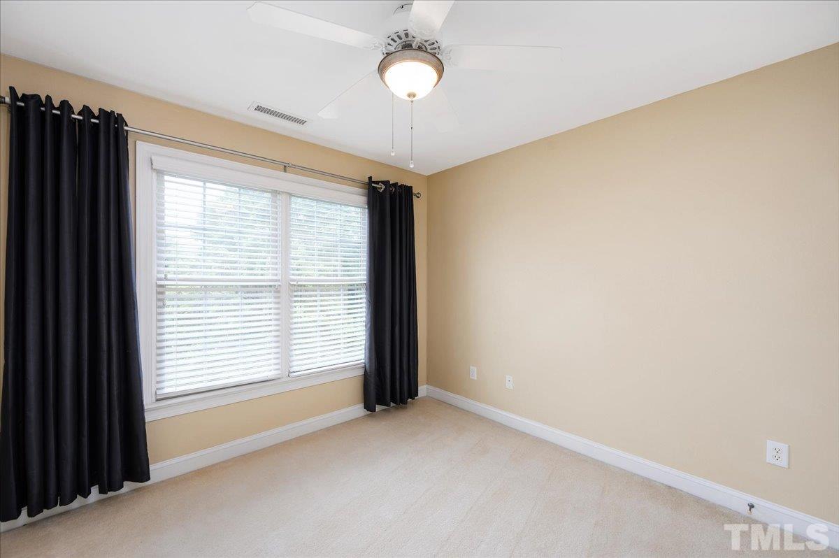 2624 Falls River Avenue Raleigh, NC 27614 - Photo 29 of 38 a view of an empty room with a window