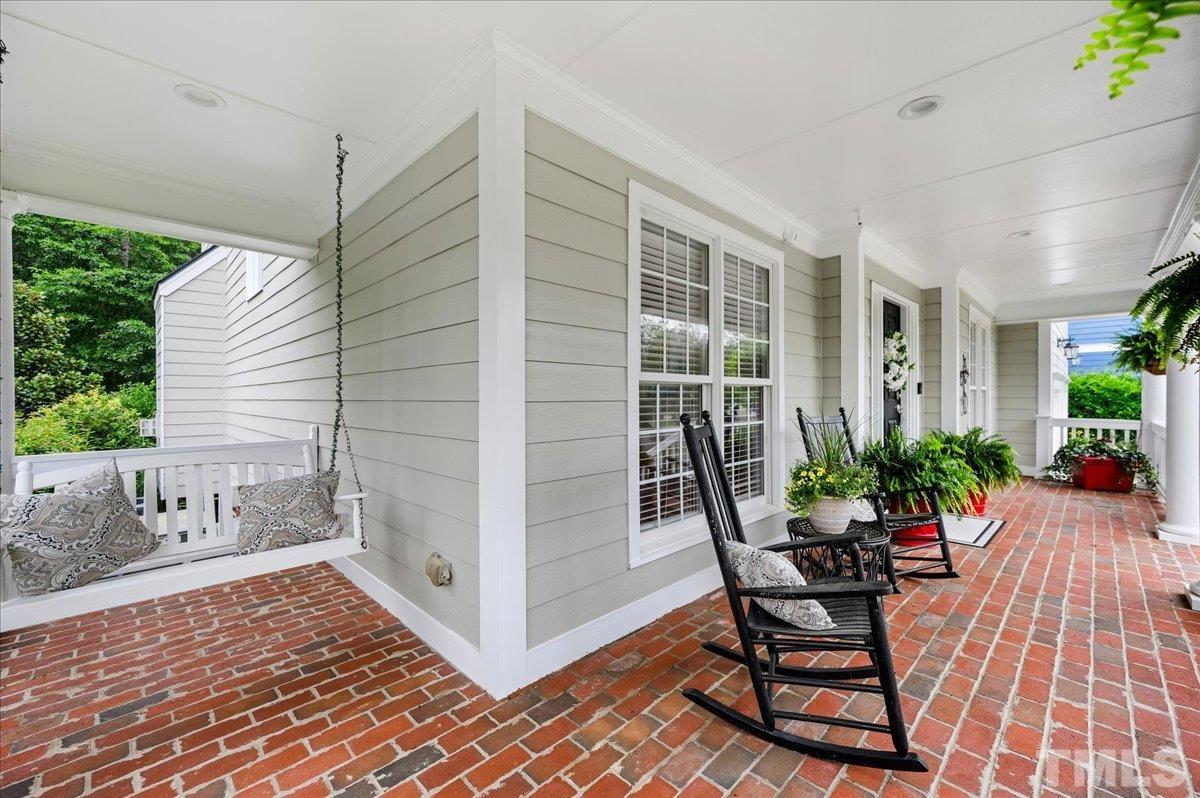 2624 Falls River Avenue Raleigh, NC 27614 - Photo 3 of 38 a view of a house with backyard and sitting area