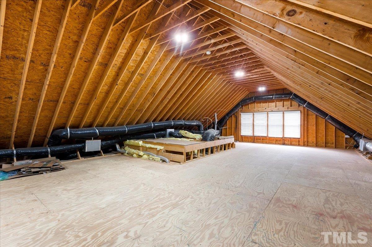 2624 Falls River Avenue Raleigh, NC 27614 - Photo 31 of 38 a view of an empty room with windows