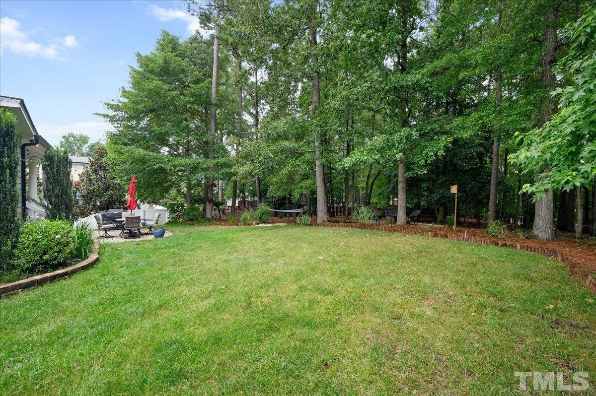 2624 Falls River Avenue Raleigh, NC 27614 - Photo 38 of 38 a garden with trees