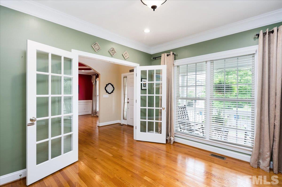 2624 Falls River Avenue Raleigh, NC 27614 - Photo 6 of 38 a view of empty room with windows