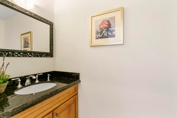 a view of a house with a yard porch and sitting area