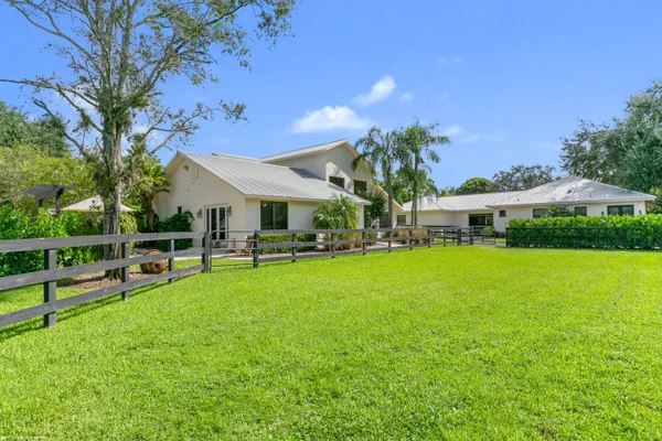 a view of a yard with an outdoor space