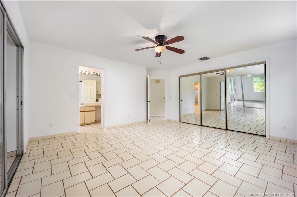 2553 Wide River Cove Stuart, FL 34994 - Photo 14 of 24 Primary Bedroom