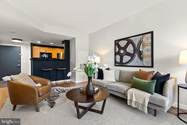 a kitchen with dining table and chairs