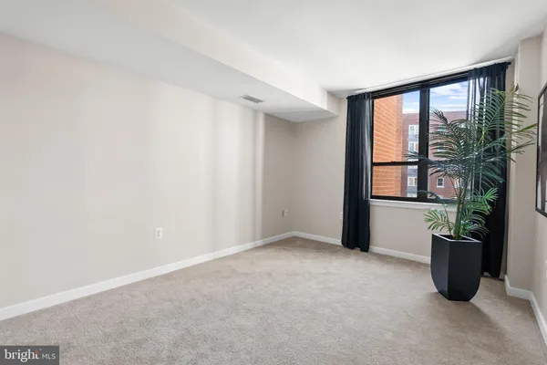 a view of a room with racks on the wall