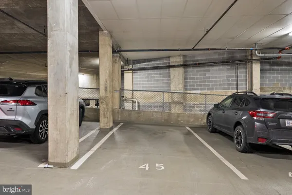 a view of a swimming pool with outdoor seating