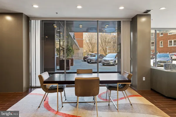 a view of a livingroom with furniture and wooden floor