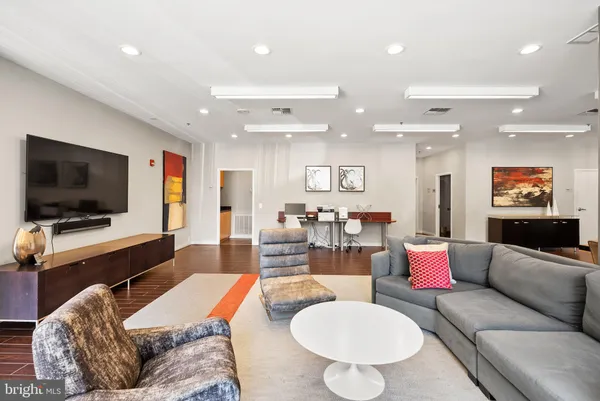 a view of a building with sitting area