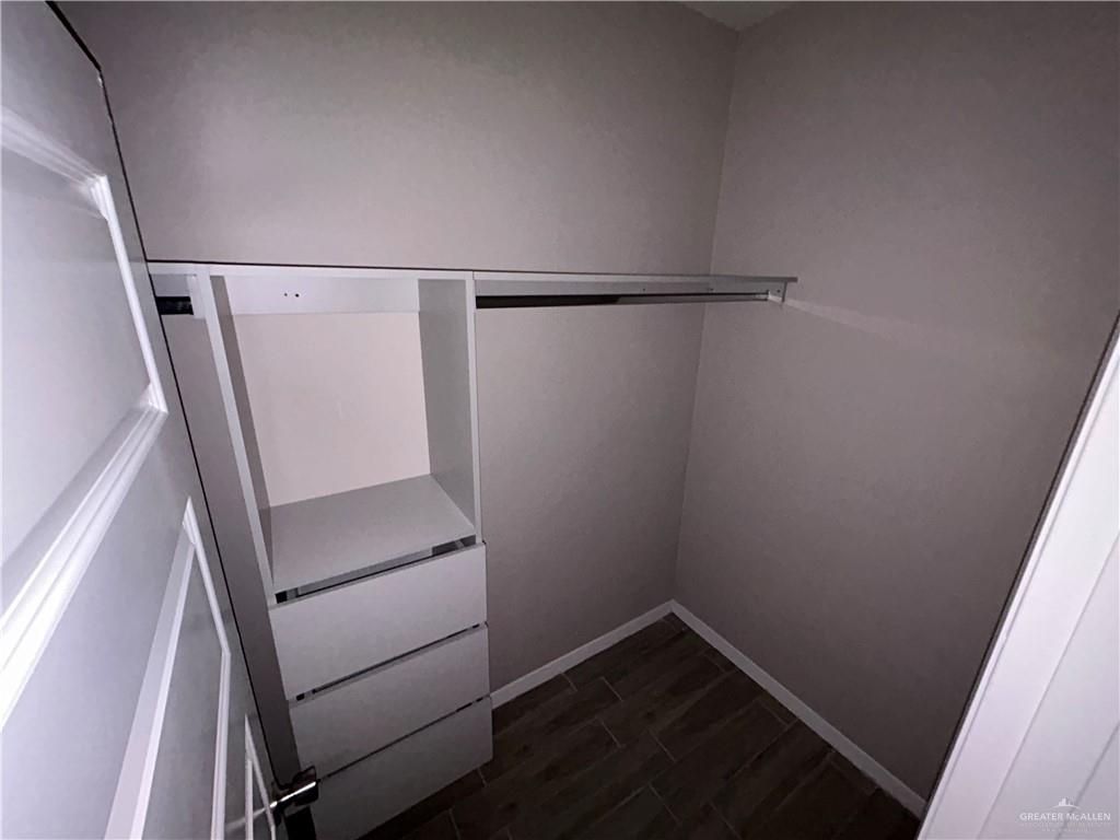 5705 Puffin Avenue, Unit 1 Mission, TX 78573 - Photo 15 of 16 a view of an empty walk in closet
