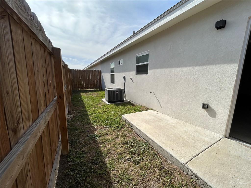 5705 Puffin Avenue, Unit 1 Mission, TX 78573 - Photo 16 of 16 a backyard of a house