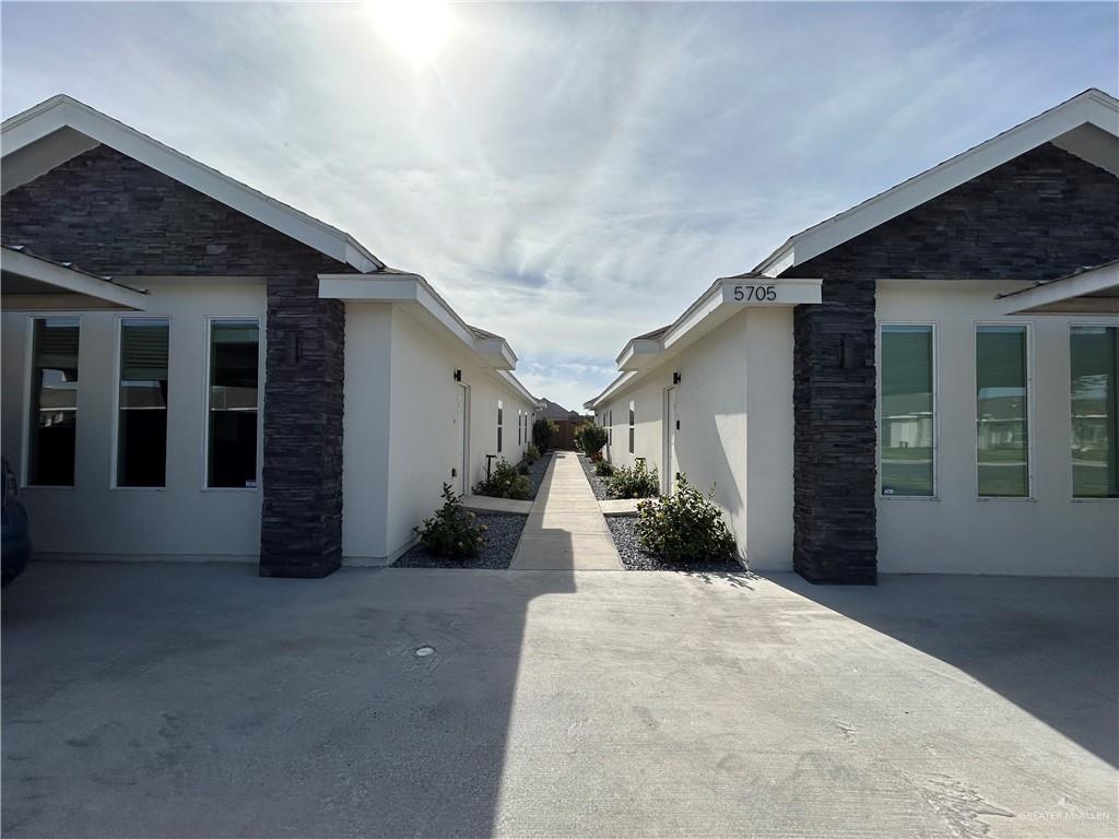 5705 Puffin Avenue, Unit 1 Mission, TX 78573 - Photo 2 of 16 a front view of a house with a yard