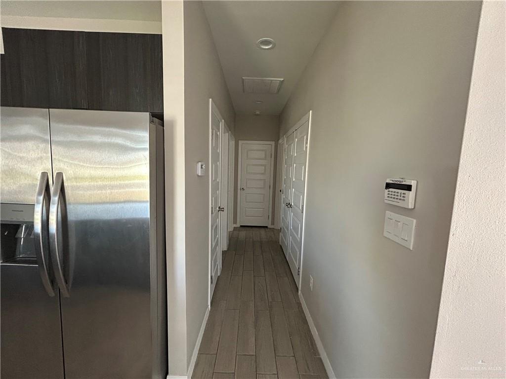5705 Puffin Avenue, Unit 1 Mission, TX 78573 - Photo 7 of 16 a view of a hallway