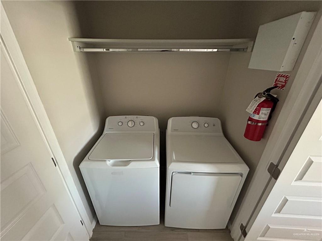5705 Puffin Avenue, Unit 1 Mission, TX 78573 - Photo 9 of 16 a utility room with dryer and washer