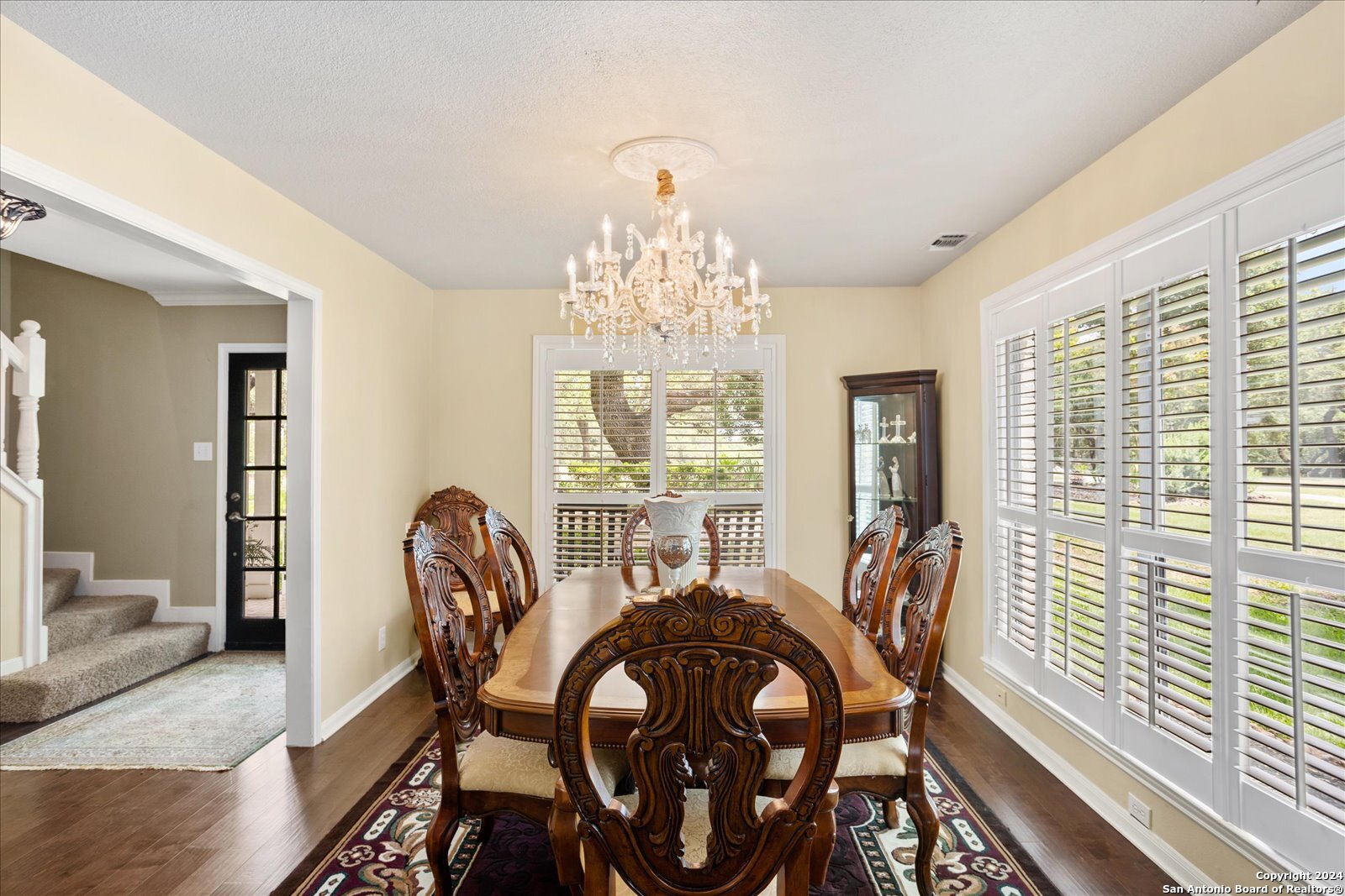 29715 Windchime Hill Fair Oaks Ranch, TX 78015 - Photo 11 of 50 a view of a dining room with furniture window and wooden floor