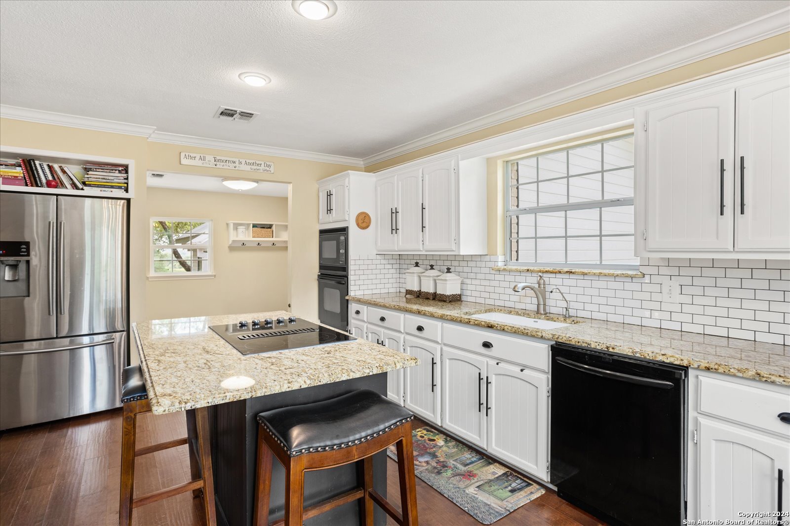 29715 Windchime Hill Fair Oaks Ranch, TX 78015 - Photo 21 of 50 a kitchen with granite countertop a sink appliances cabinets and counter space
