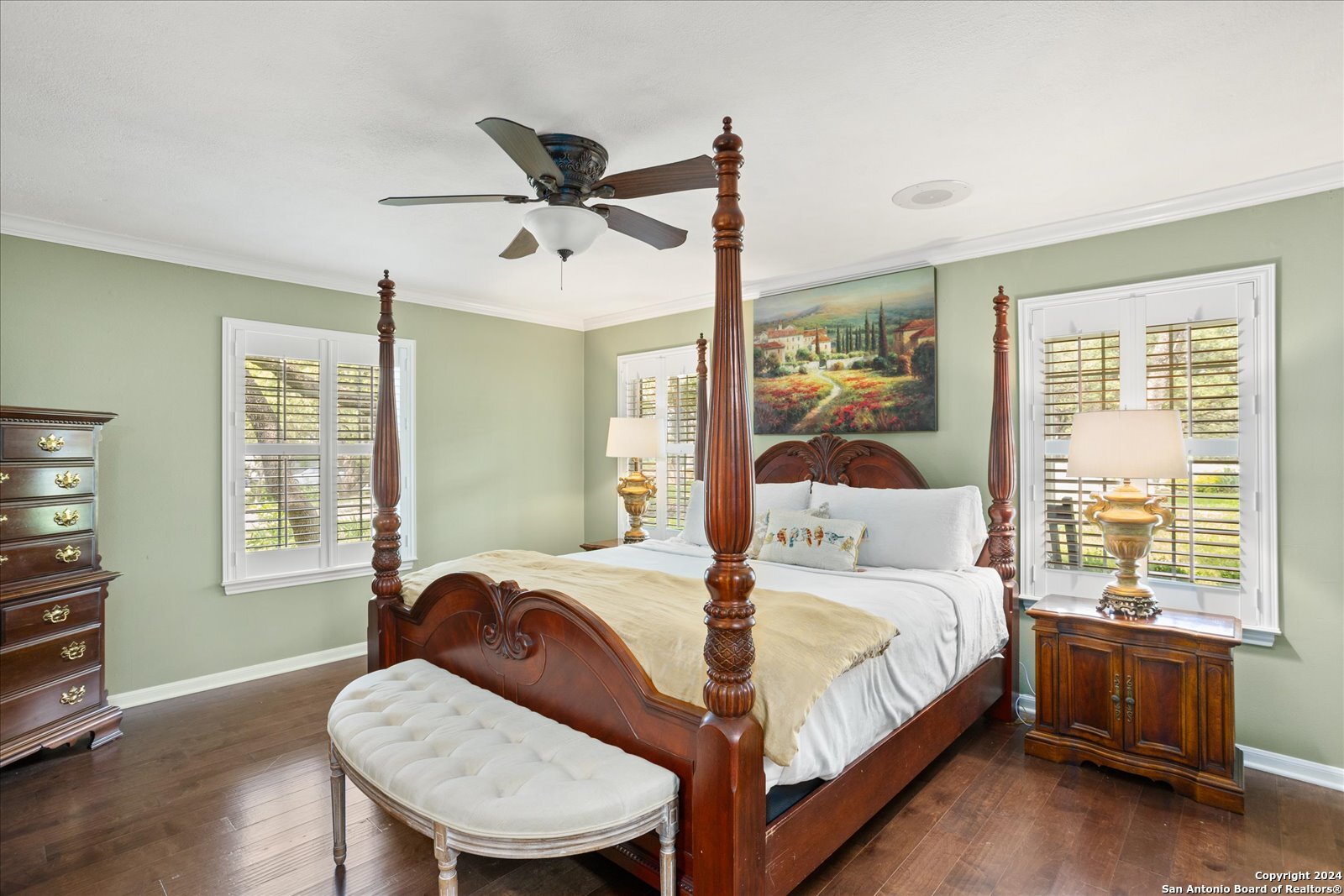 29715 Windchime Hill Fair Oaks Ranch, TX 78015 - Photo 27 of 50 a bedroom with a bed a table and chair