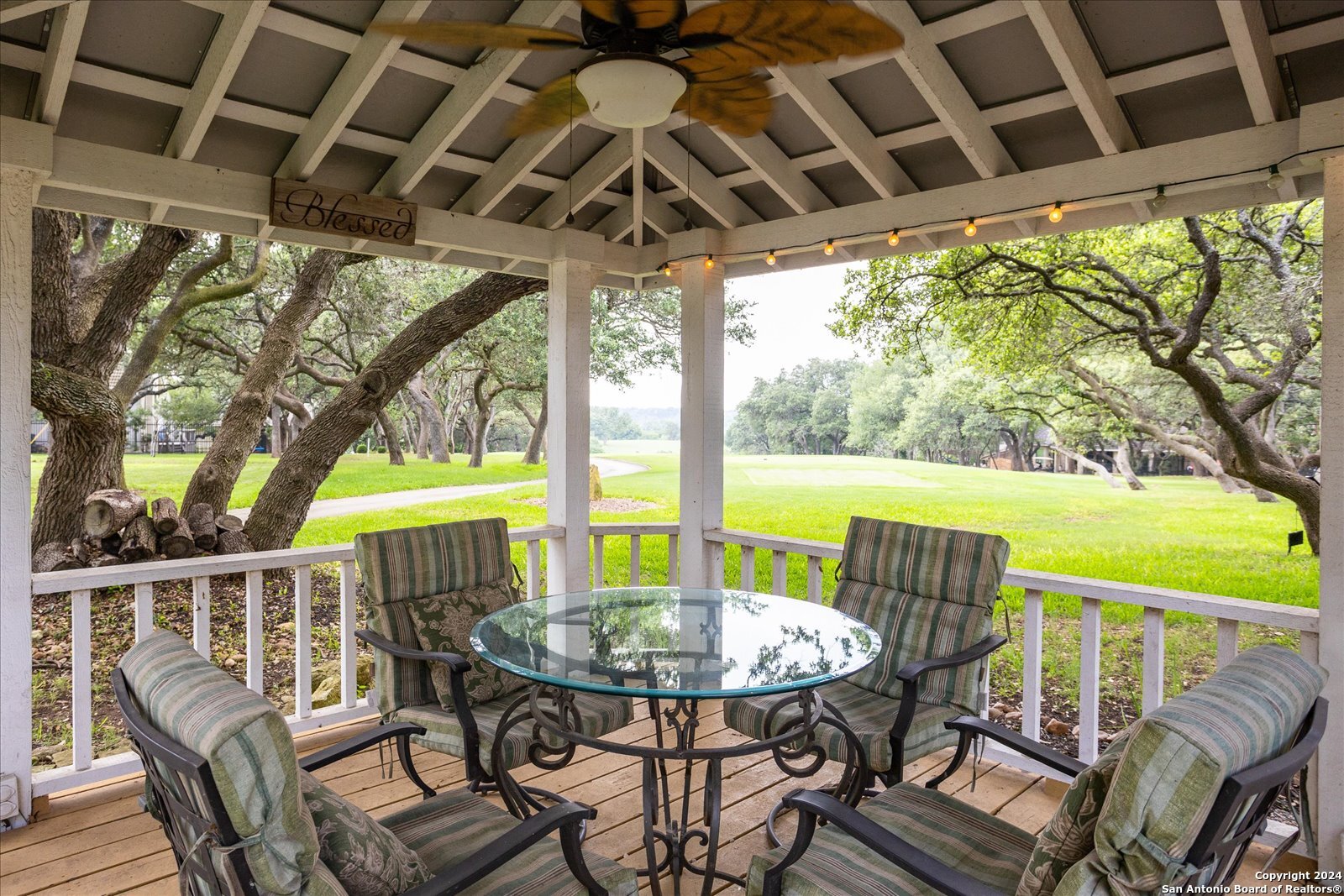 29715 Windchime Hill Fair Oaks Ranch, TX 78015 - Photo 41 of 50 a view of porch with a table and chairs