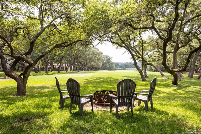 a garden view with a seating space