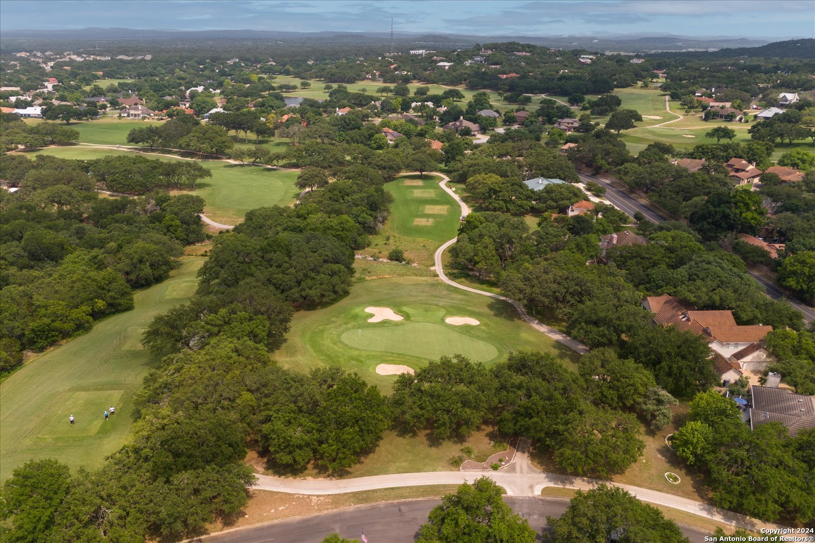 29715 Windchime Hill Fair Oaks Ranch, TX 78015 - Photo 50 of 50 an aerial view of residential houses with outdoor space and trees