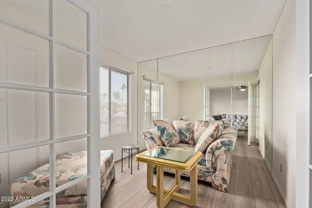 a living room with furniture and a window