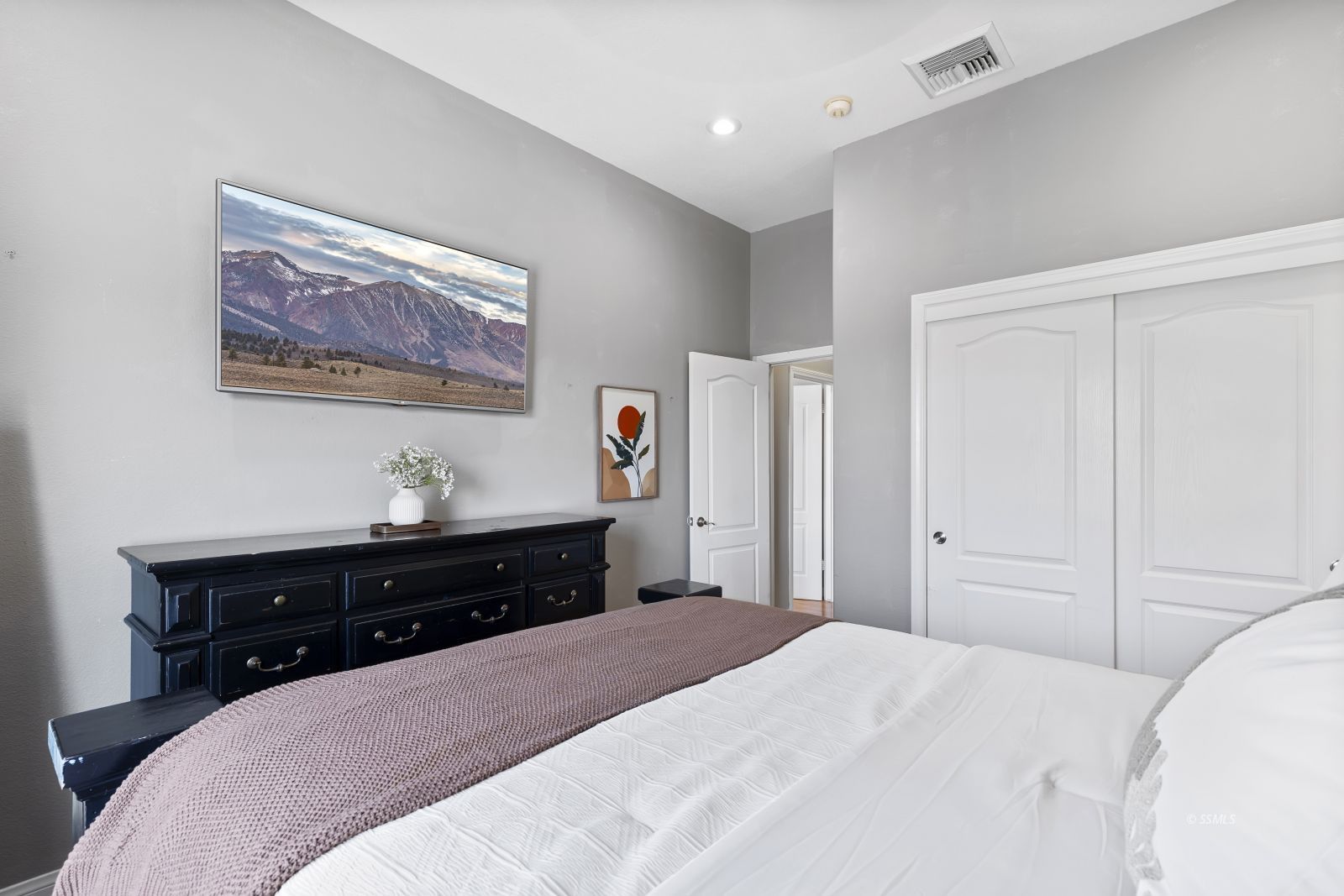 107 Brianna Street Ridgecrest, CA 93555 - Photo 35 of 50 a bedroom with a bed and a dresser