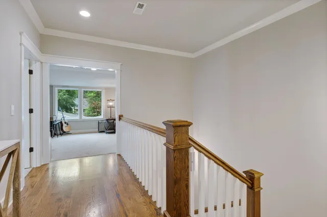 a view of a hallway with a window