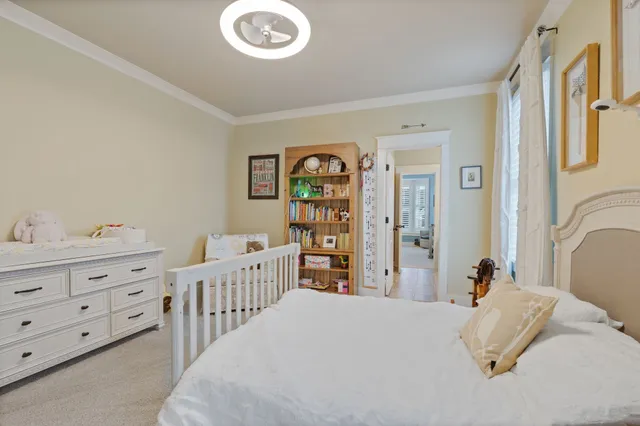 a bedroom with a bed and a cabinets