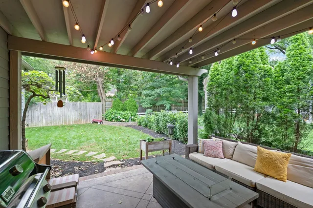 a outdoor living space with furniture and garden view