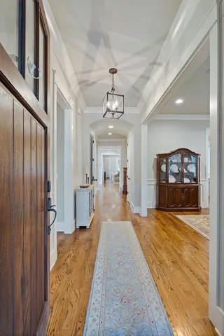 a view of a living room and a chandelier