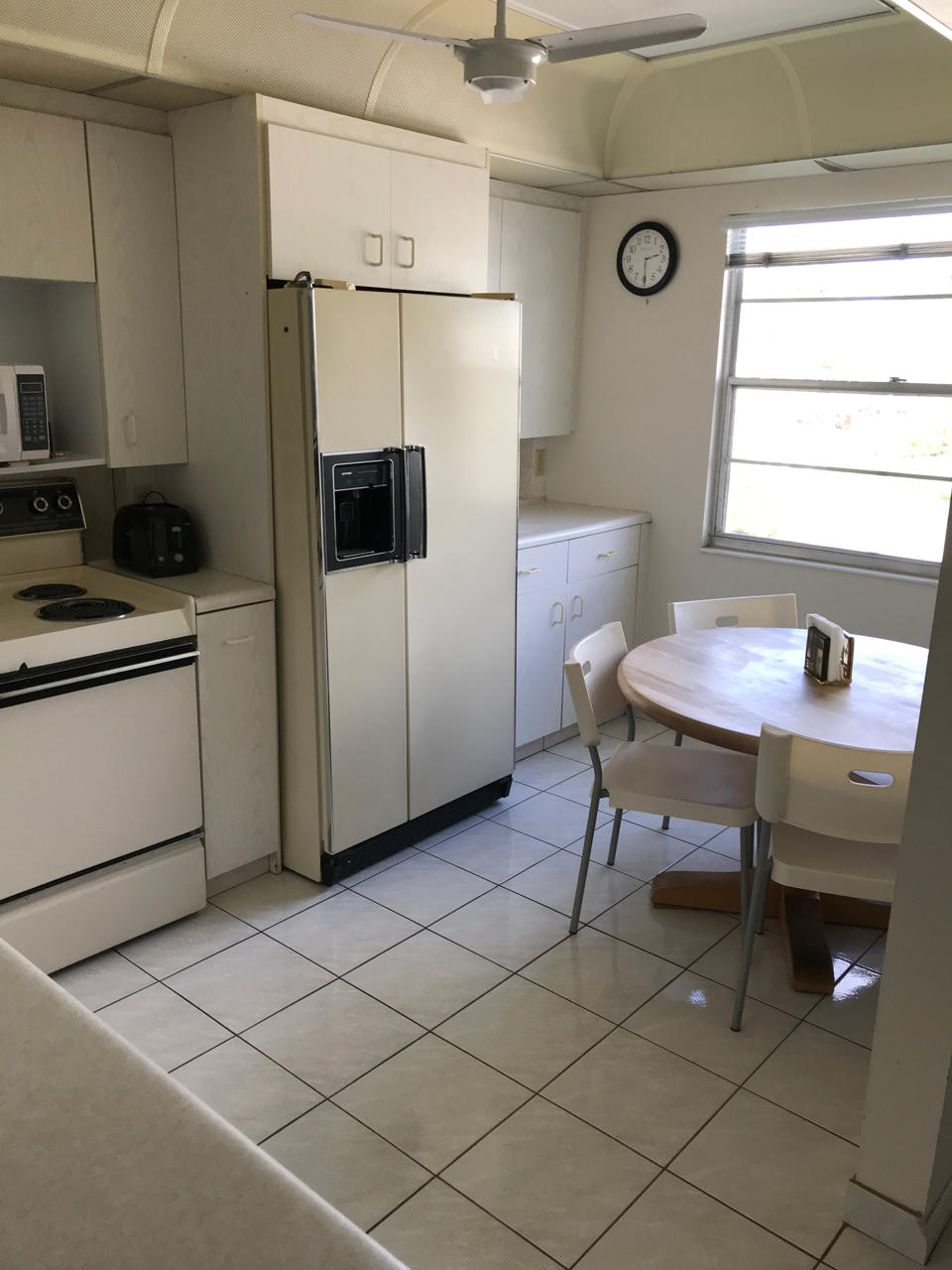 2073 Exeter, Unit E Boca Raton, FL 33434 - Photo 13 of 27 a work place with furniture and window