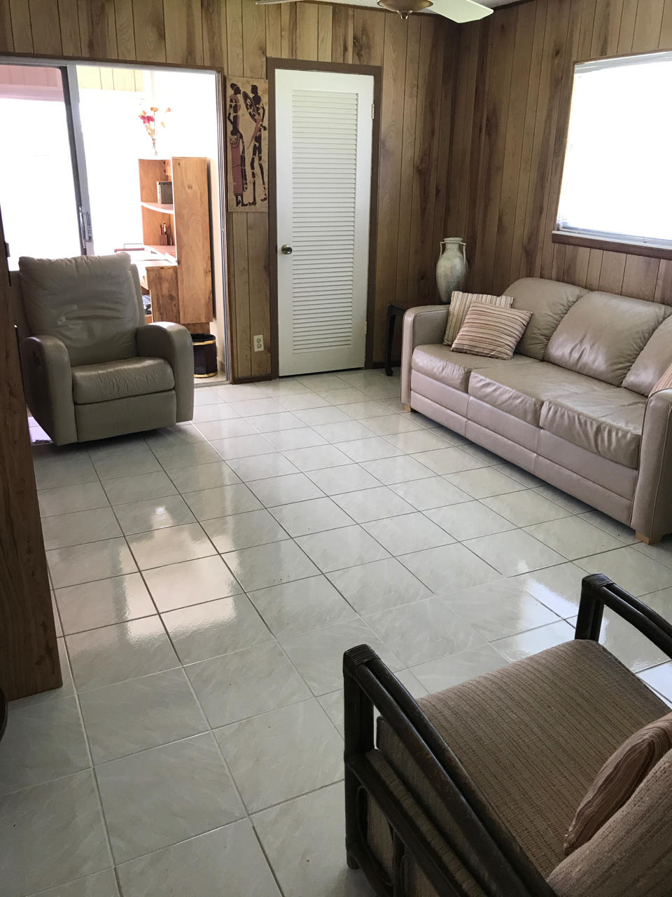 2073 Exeter, Unit E Boca Raton, FL 33434 - Photo 8 of 27 a living room with furniture and a couch