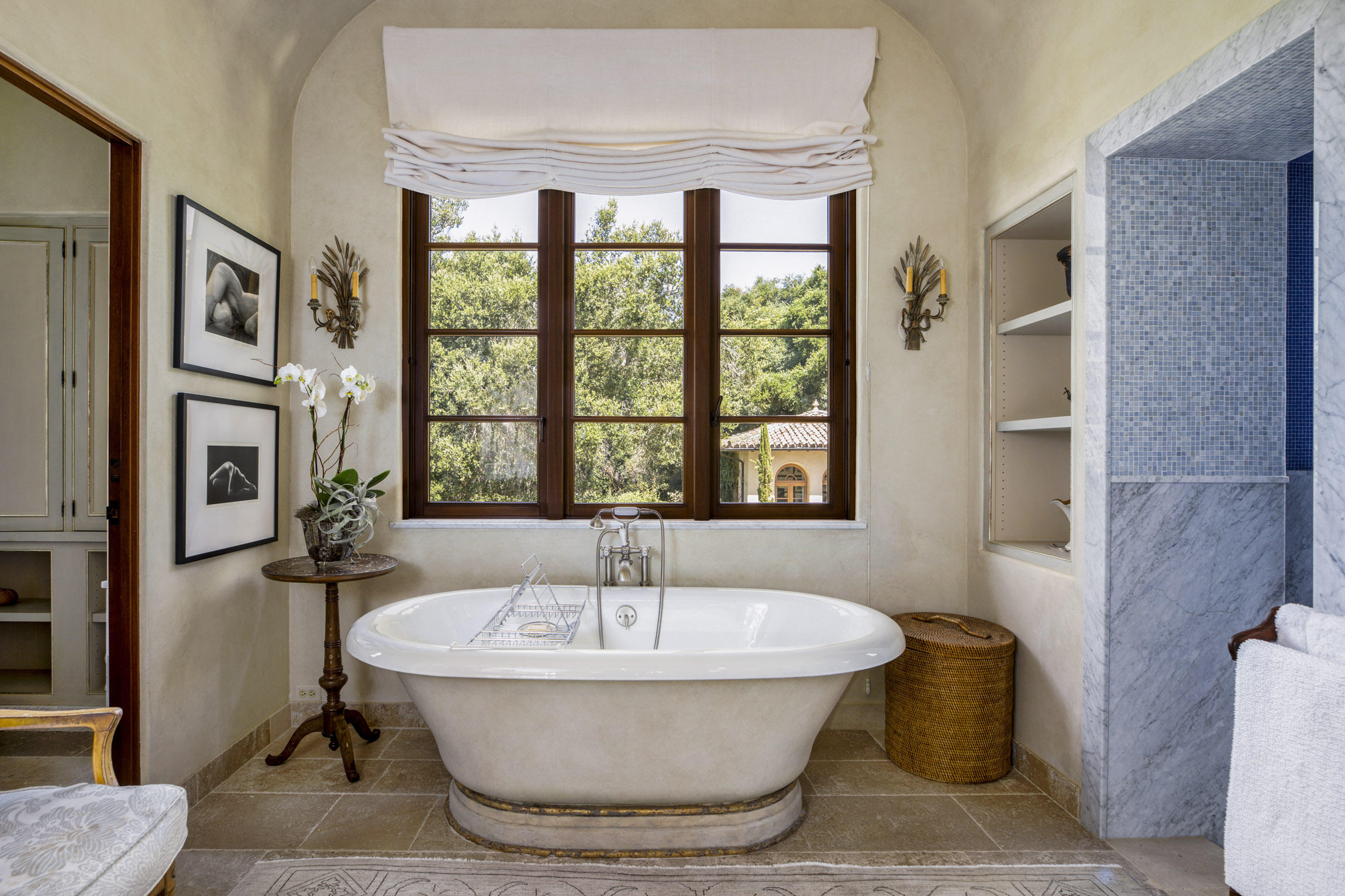 854 Rockbridge Road Santa Barbara, CA 93108 - Photo 15 of 34 a white bath tub sitting in a bathroom next to a window