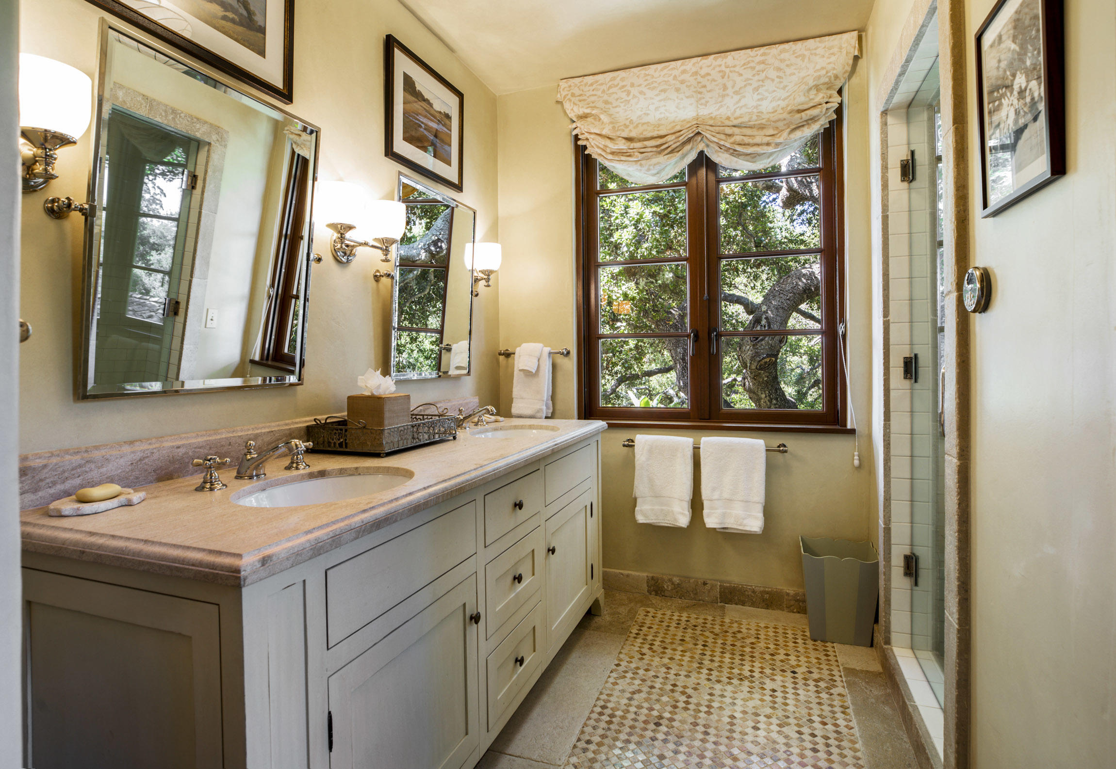 854 Rockbridge Road Santa Barbara, CA 93108 - Photo 17 of 34 a bathroom with a sink and a mirror