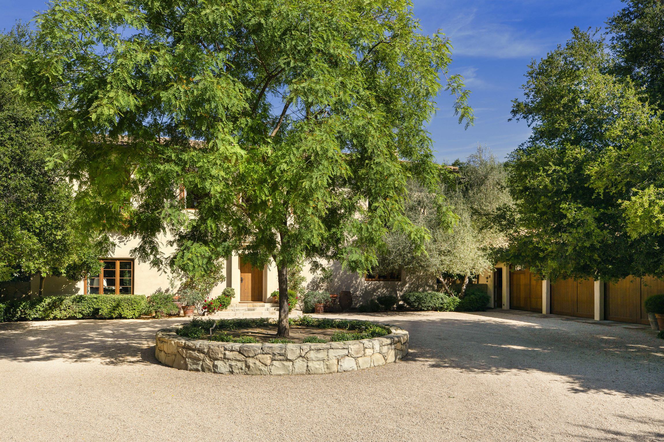 854 Rockbridge Road Santa Barbara, CA 93108 - Photo 33 of 34 a building with trees in front of it
