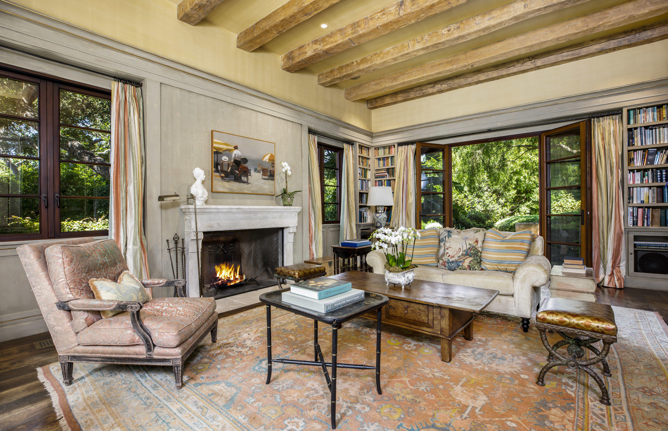 854 Rockbridge Road Santa Barbara, CA 93108 - Photo 5 of 34 a living room with furniture and a fireplace
