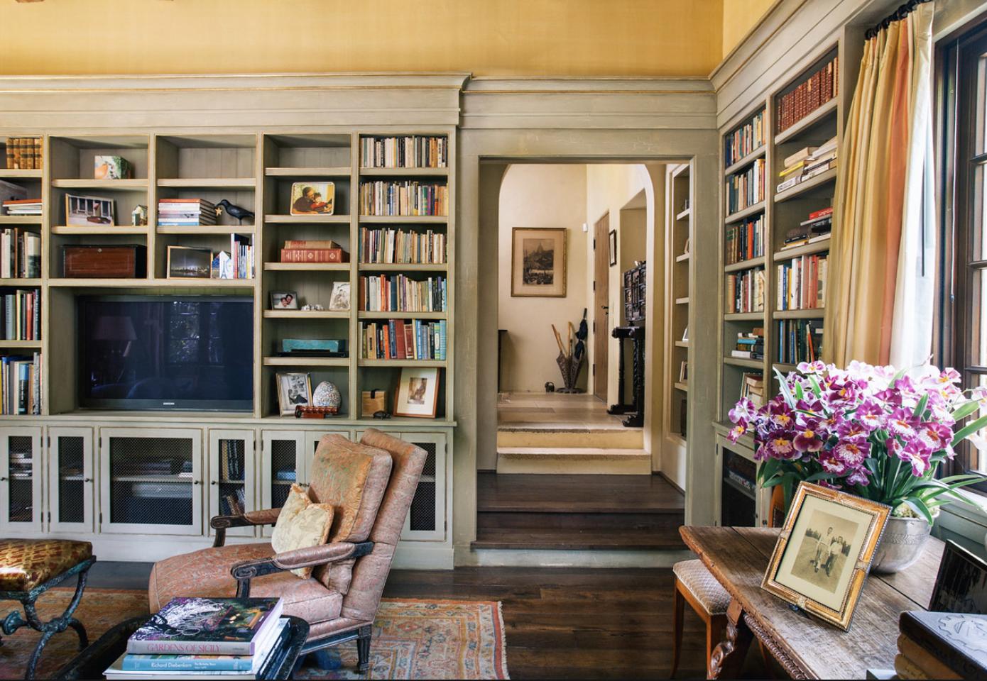 854 Rockbridge Road Santa Barbara, CA 93108 - Photo 6 of 34 a living room with furniture and book shelf