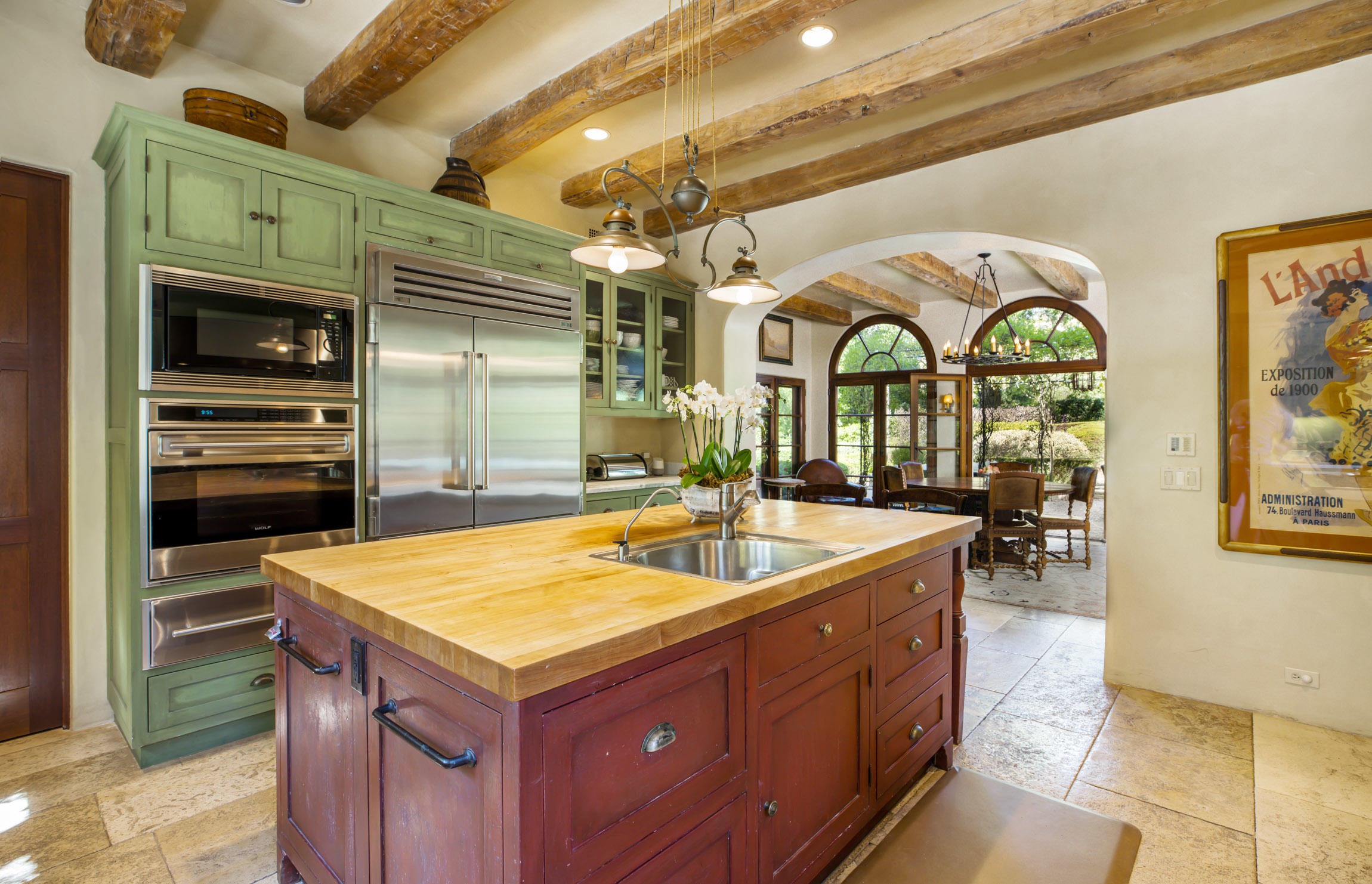 854 Rockbridge Road Santa Barbara, CA 93108 - Photo 10 of 34 a kitchen with stainless steel appliances granite countertop a sink and a refrigerator